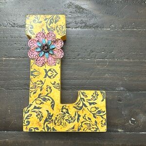 Letter L floral decor block with hole to hang.